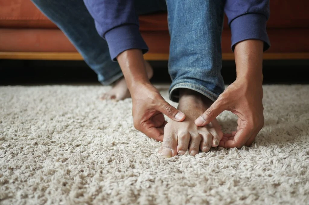 Person massaging their foot